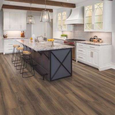 luxury vinyl plank flooring in a rustic Lake Charles kitchen with island 